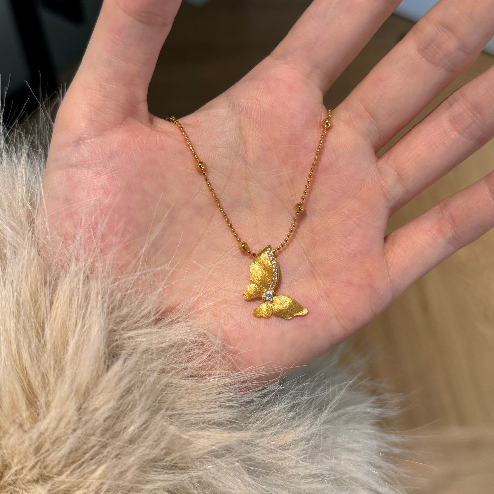 3fc8e715-f87d-4753-a45a-54b316a70929-1.jpg New Classic Retro Frosted Butterfly Necklace - Image 1