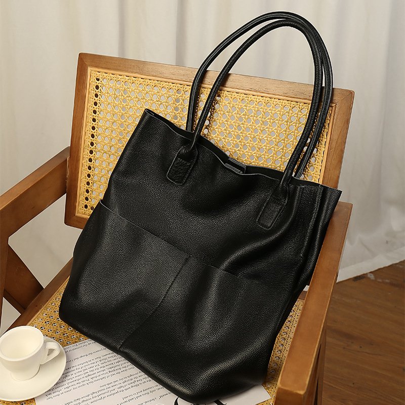 eb5aa368-1216-46af-abaa-80b6351c855d-1.jpg Simple Commute Soft Cowhide Bucket Bag - Image 1